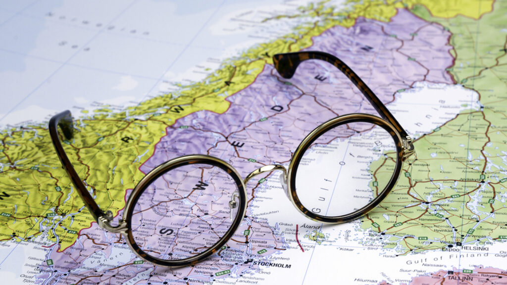 Glasses on a map of europe Sweden.