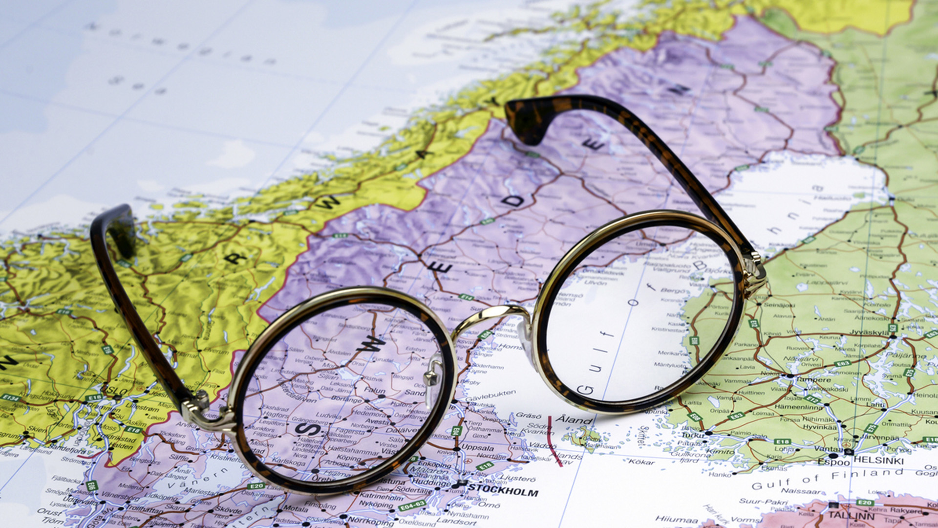 Glasses on a map of europe Sweden.